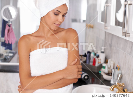 Woman, towel and thinking in bathroom, shower fresh in home with soft body. Wash, clean or grooming for skincare and relax ideas, wellness or self care vision for female person in apartment 140577642