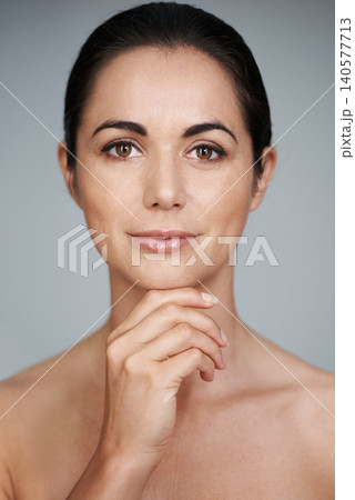 Woman, studio and portrait with thinking, skin and care for treatment and proud. Model, cosmetics and natural with lip gloss, glow and aesthetic for antiaging confidence isolated on white background Woman, studio and portrait with thinking, skin and care for treatment and proud. Model, cosmetics and natural with lip gloss, glow and aesthetic for antiaging confidence isolated on white background 140577713