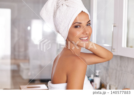 Woman, towel and fresh in bathroom, smile and shower for hygiene in apartment. Wash, clean or grooming skincare portrait for wellness or self care, health and glowing face routine for female person Woman, towel and fresh in bathroom, smile and shower for hygiene in apartment. Wash, clean or grooming skincare portrait for wellness or self care, health and glowing face routine for female person 140577883