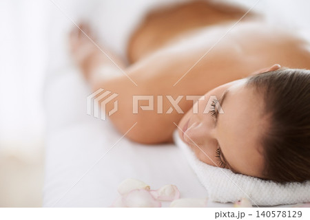 Woman, massage and ready for treatment, lying and beauty therapy for body care at spa. Female person, relax and serene or dermatology, cosmetics and rest at resort hotel and peace or pamper at salon Woman, massage and ready for treatment, lying and beauty therapy for body care at spa. Female person, relax and serene or dermatology, cosmetics and rest at resort hotel and peace or pamper at salon 140578129