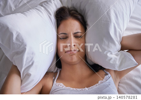 Bed, night and woman frustrated with sleeping with anxiety, restless and unhappy on soft mattress. Apartment, home and female person depressed with mental health in bedroom of house with insomnia Bed, night and woman frustrated with sleeping with anxiety, restless and unhappy on soft mattress. Apartment, home and female person depressed with mental health in bedroom of house with insomnia 140578281