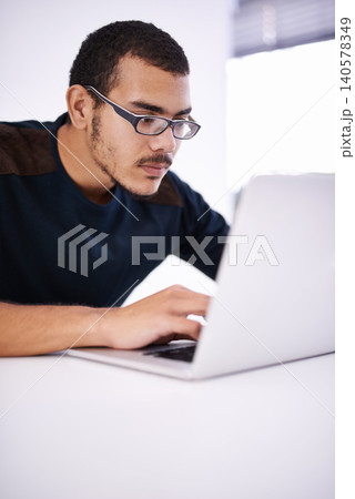 Elearning, glasses and man typing on laptop for research, study or opportunity for university education. Computer, knowledge and college student with online course for programming, software or coding Elearning, glasses and man typing on laptop for research, study or opportunity for university education. Computer, knowledge and college student with online course for programming, software or coding 140578349