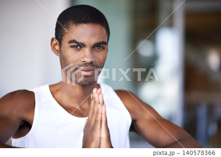 Man, portrait and meditation in home for fitness, wellness or diet on blurred background for exercise and namaste. African person and trainer with smile and hands together for zen, calm and peace Man, portrait and meditation in home for fitness, wellness or diet on blurred background for exercise and namaste. African person and trainer with smile and hands together for zen, calm and peace 140578366