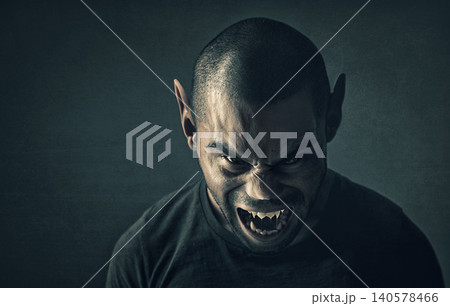Monster, man and face with horror in studio for fantasy, demon and angry vampire with fangs, scary and terror. Werewolf, devil and creepy creature with shouting, rage and surreal on black background Monster, man and face with horror in studio for fantasy, demon and angry vampire with fangs, scary and terror. Werewolf, devil and creepy creature with shouting, rage and surreal on black background 140578466