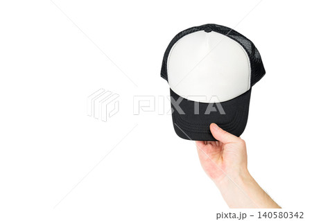 cap full face in a man hand on a white background cap full face in a man hand on a white background 140580342