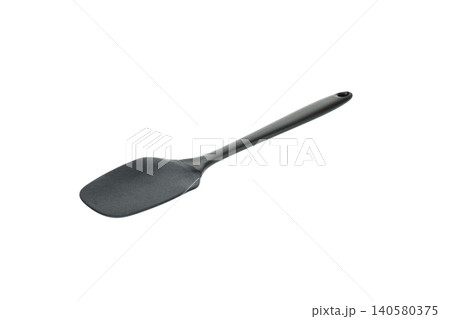 black pastry spatula made of silicone on an isolated white background black pastry spatula made of silicone on an isolated white background 140580375