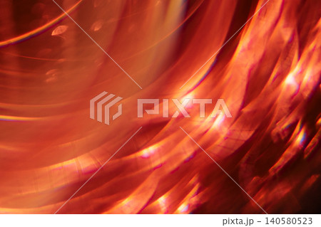 Abstract close-up image of swirling orange and red light patterns creating a vibrant, dynamic visual effect with a smooth gradient and soft focus Abstract close-up image of swirling orange and red light patterns creating a vibrant, dynamic visual effect with a smooth gradient and soft focus 140580523