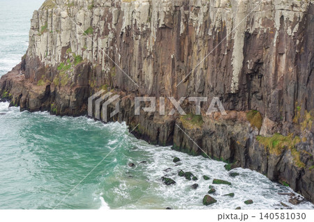 immense basalt cliffs on the beach of Torres, Rio grande do Sul, Brazil 140581030