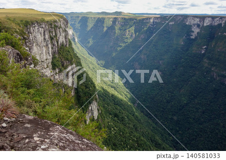 amazing view of Fortaleza canyon in Cambara do Sul, RS, Brazil, at daytime. Panoramic amazing view of Fortaleza canyon in Cambara do Sul, RS, Brazil, at daytime. Panoramic 140581033