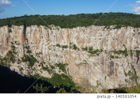 immense walls of basaltic rock forming a huge canyon. Cambara do Sul, RS, Brazil. Itaimbezinho canyon. 140581054