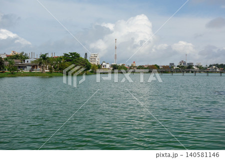 Violao lagoon and buildings cityscape in background. Torres city, RS, Brazil 140581146