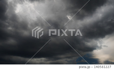 Dramatic dark storm thundercloud rain clouds on black sky background. Dark thunderstorm clouds rainny landscape. Meteorology danger windstorm disaster climate. Dark cloudscape storm disaster gray sky Dramatic dark storm thundercloud rain clouds on black sky background. Dark thunderstorm clouds rainny landscape. Meteorology danger windstorm disaster climate. Dark cloudscape storm disaster gray sky 140581227