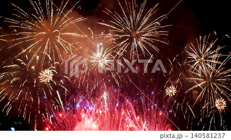 Purple Firework celebrate anniversary happy new year 2024, 4th of july holiday festival. Purple firework in night time celebrate national holiday. Violet firework Countdown to new year 2024 festival 140581237