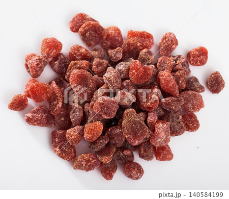 Dried strawberries on white surface 140584199
