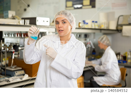 Shot of an young woman using equipment to work in a laboratory Shot of an young woman using equipment to work in a laboratory 140584552