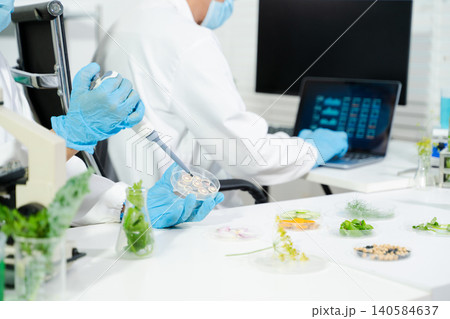 Scientists conduct laboratory food testing and biotech research using advanced equipment, ensuring safety, quality, and innovation in modern science environments. Scientists conduct laboratory food testing and biotech research using advanced equipment, ensuring safety, quality, and innovation in modern science environments. 140584637