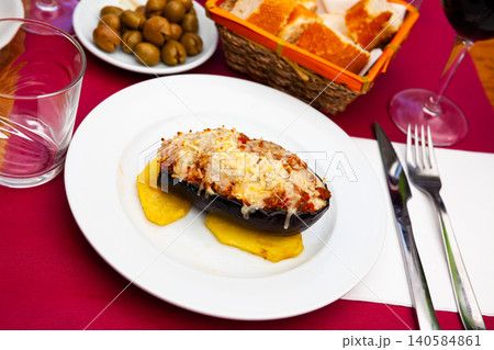 Image of a stuffed eggplant with cheese baked on top 140584861