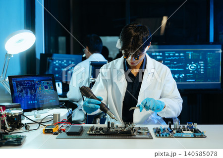 Professional engineer repairing PCB circuit in a modern lab, showcasing electronics, technology, innovation, testing, and advanced Professional engineer repairing PCB circuit in a modern lab, showcasing electronics, technology, innovation, testing, and advanced 140585078