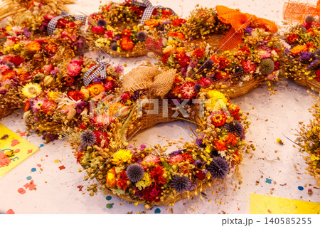 Dried flowers arranged in a beautiful wreaths Dried flowers arranged in a beautiful wreaths 140585255
