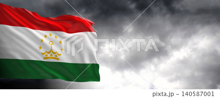 National flag of Tajikistan with dark clouds in the background 140587001