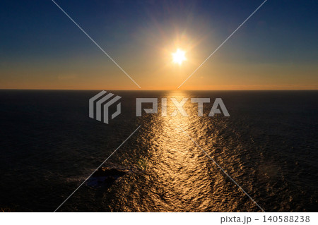 View of the Atlantic Ocean from Cabo da Roca at sunset. Cabo da Roca or Cape Roca is westernmost cape of mainland Portugal, continental Europe and the Eurasian land mass View of the Atlantic Ocean from Cabo da Roca at sunset. Cabo da Roca or Cape Roca is westernmost cape of mainland Portugal, continental Europe and the Eurasian land mass 140588238