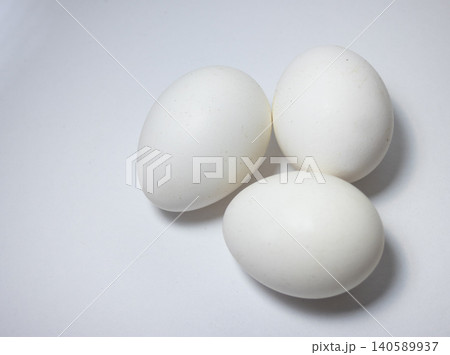 Top view, close up picture of a group of eggs , isolated ,on white background Top view, close up picture of a group of eggs , isolated ,on white background 140589937