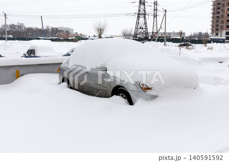 cars under the snow, winter 140591592