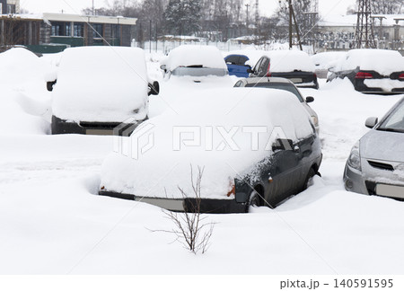 cars under the snow, winter 140591595