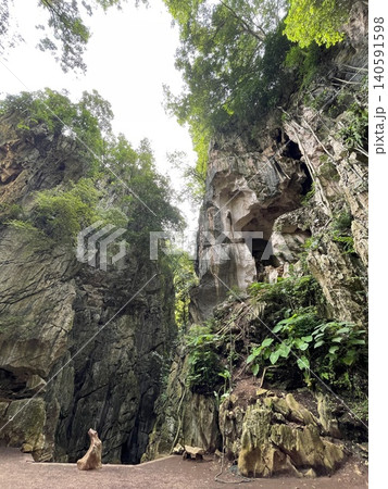 Natural Cave and Limestone Cliffs at Kin Loong Valley, Ipoh Natural Cave and Limestone Cliffs at Kin Loong Valley, Ipoh 140591598