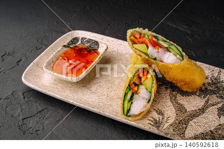 Fried shrimp tempura spring rolls with sweet chili sauce Fried shrimp tempura spring rolls with sweet chili sauce 140592618