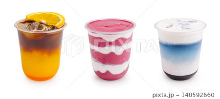 Refreshing summer drinks in plastic cups on white background Refreshing summer drinks in plastic cups on white background 140592660