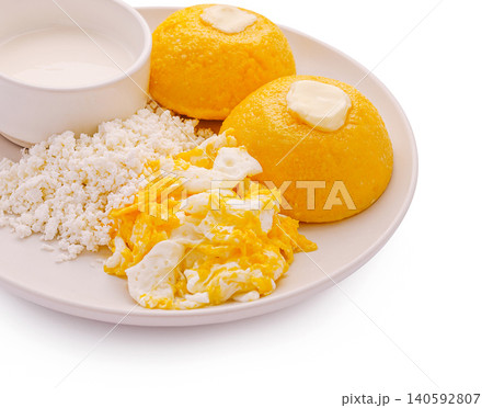 Mamaliga cornmeal porridge with eggs and cottage cheese 140592807