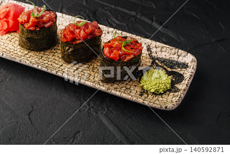 Spicy tuna gunkan sushi with wasabi and ginger Spicy tuna gunkan sushi with wasabi and ginger 140592871