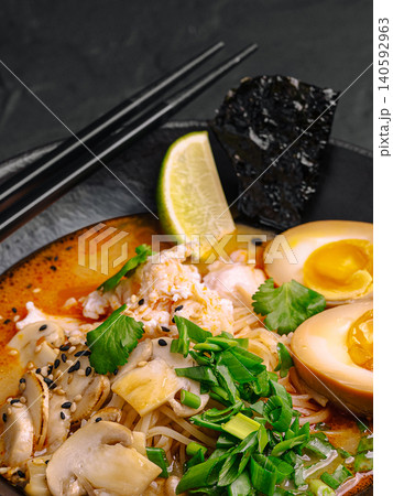 Spicy ramen with noodles egg mushrooms and crabs Spicy ramen with noodles egg mushrooms and crabs 140592963
