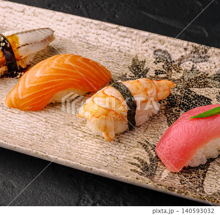 Assorted nigiri sushi set on ceramic plate Assorted nigiri sushi set on ceramic plate 140593032