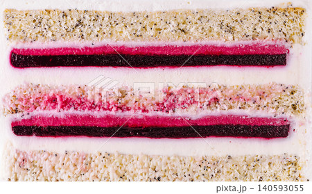Layered sponge cake with poppy seeds and berries 140593055