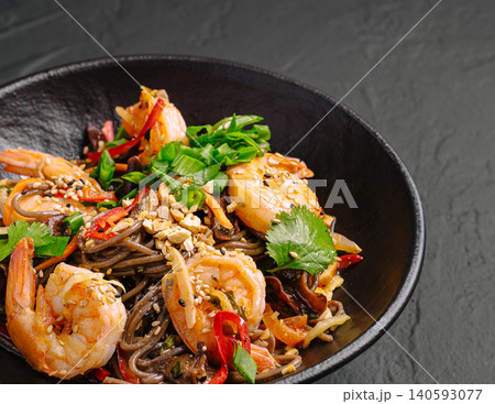 Stir fried soba noodles with juicy prawns Stir fried soba noodles with juicy prawns 140593077