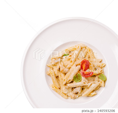 Creamy chicken penne pasta with cherry tomatoes and basil Creamy chicken penne pasta with cherry tomatoes and basil 140593206