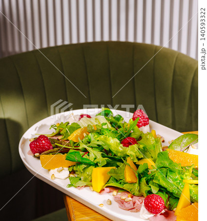 Fresh Salad with Fruits Berries and Prosciutto Fresh Salad with Fruits Berries and Prosciutto 140593322
