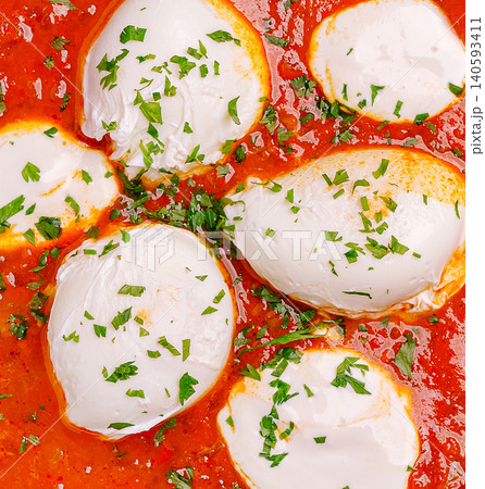 Traditional Middle Eastern shakshuka with poached eggs Traditional Middle Eastern shakshuka with poached eggs 140593411