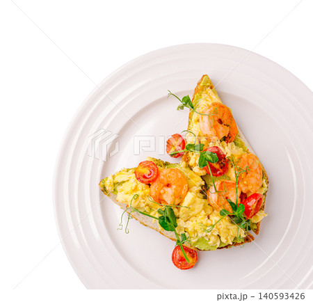 Avocado toast with scrambled eggs and prawns Avocado toast with scrambled eggs and prawns 140593426