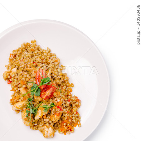 Boiled buckwheat with chicken and fresh tomatoes Boiled buckwheat with chicken and fresh tomatoes 140593436