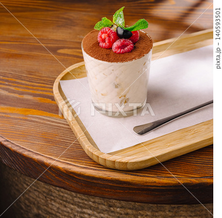 Italian Tiramisu Dessert In Glass With Fresh Berries Italian Tiramisu Dessert In Glass With Fresh Berries 140593501