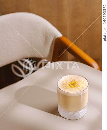 Banana Cocktail Drink With Creamy Foam Layer Banana Cocktail Drink With Creamy Foam Layer 140593570