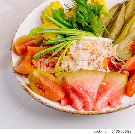 Assorted Pickled Vegetables Platter On White Assorted Pickled Vegetables Platter On White 140593583