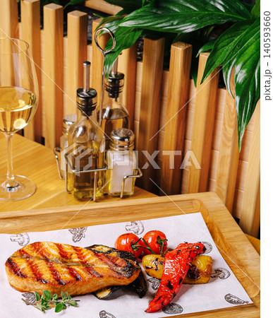 Grilled Salmon Steak With Vegetables And Wine Grilled Salmon Steak With Vegetables And Wine 140593660