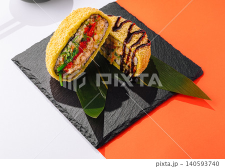 Fried Tempura Sushi Burger Cut In Half 140593740