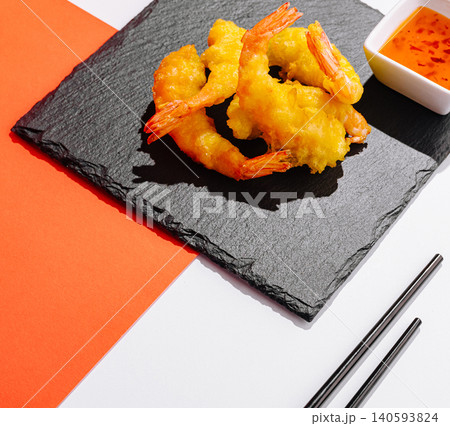 Crispy Shrimp Tempura On Black Slate Board Crispy Shrimp Tempura On Black Slate Board 140593824