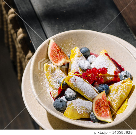 Sweet Crepes with Fresh Figs and Berries Sweet Crepes with Fresh Figs and Berries 140593929