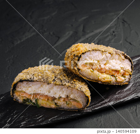 Fried Sushi Burger Halves On Black Stone Slate 140594109